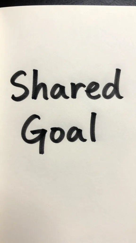 Closeup of a single notebook page with a shared goal written in bold