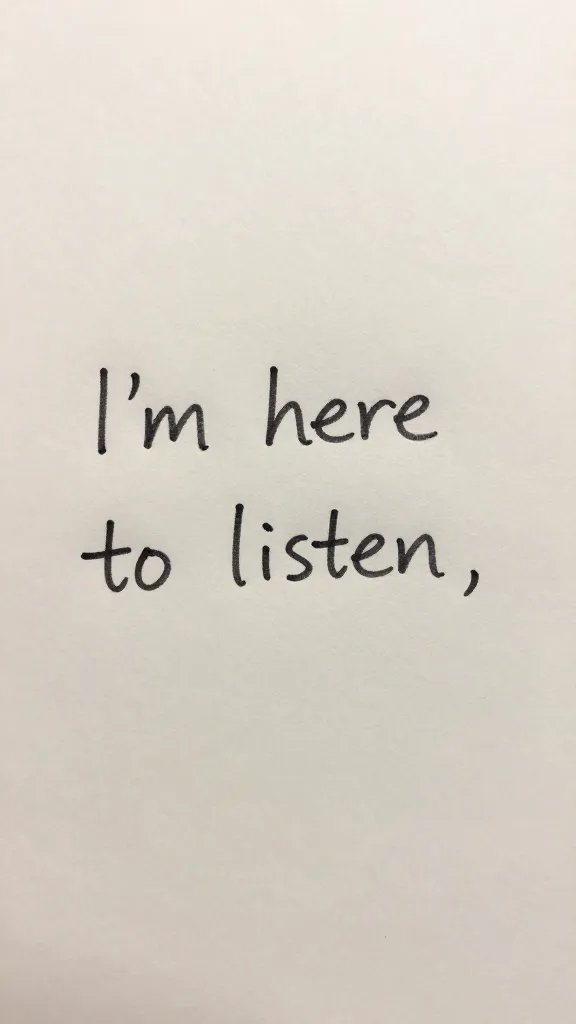Close-up of a handwritten note saying “I’m here to listen,” on plain desk surface