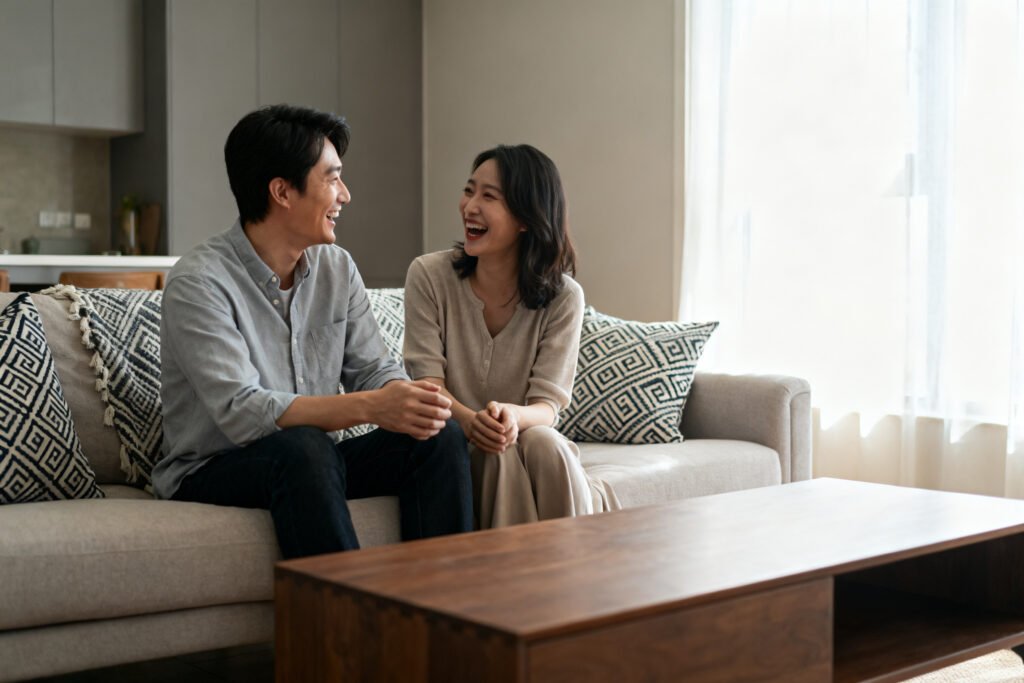 A couple laughing while talking