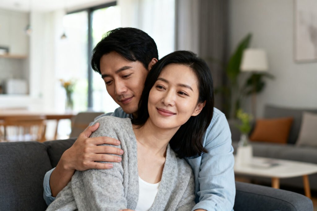 A couple sharing a close, warm moment