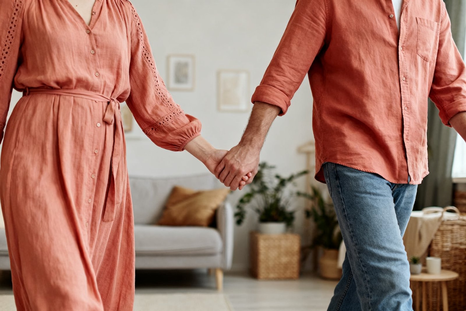 A couple taking a weekend walk holding hands