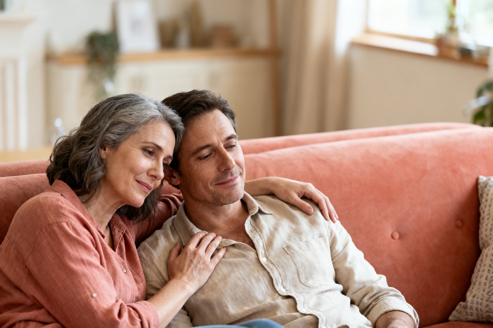 A tender, supportive moment on the sofa