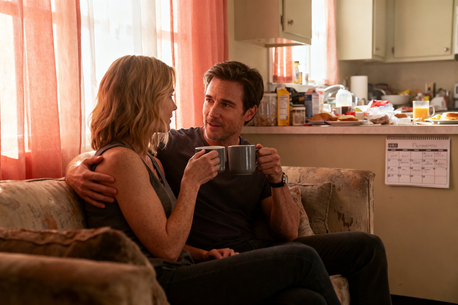 A busy couple carving out a cozy moment together, sharing coffee and conversation before the day starts