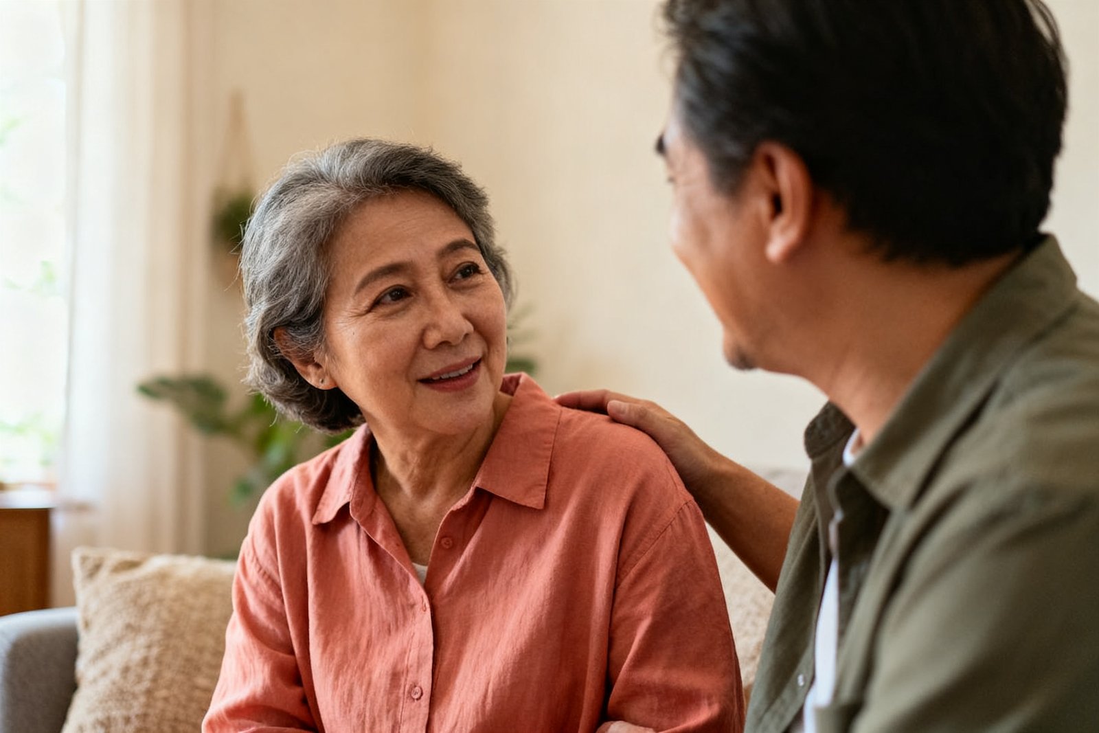 Two people talking softly with reassuring body language
